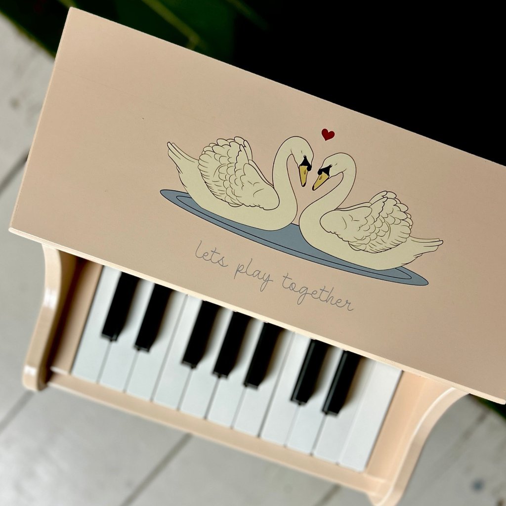 Konges Slojd Mini Toy Piano with a swan print
