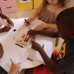 Children With various Skin Tones Colouring Together With Colour Me Kids Skin Tone Crayons 