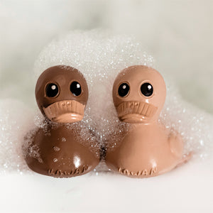 Hevea Kawan Natural Rubber Duck in a Sandy Nude Colour next to a Choco Latte Colourway 