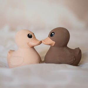 Hevea Kawan Natural Rubber Duck in a Sandy Nude Colour Kissing a Choco Latte Colour